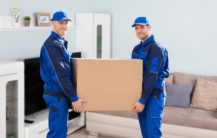 Two People Carrying a Box Two People Carrying a Box